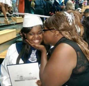 Yolicia graduating from High School, on her way to college! The first in her family to ever do so!|Image Credit: Yolicia Mitchell