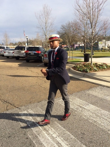 Quincy Wheaton walking to class on the GSU campus 